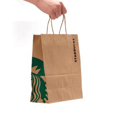 So sánh để lựa chọn túi giấy kraf hay túi giấy couche cho mặt hàng thời trang